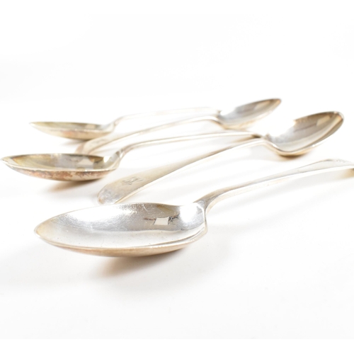 50 - A collection of five George V hallmarked silver table spoons.ÿThe five spoons having a fiddle patter... 