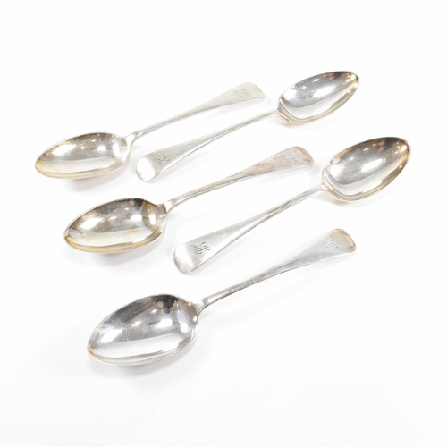 50 - A collection of five George V hallmarked silver table spoons.ÿThe five spoons having a fiddle patter... 