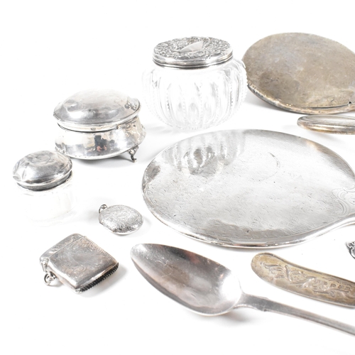 52 - A collection hallmarked silver items.ÿ The lot to include a vanity mirror, brushes, vesta case, cut ... 