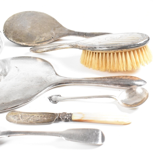 52 - A collection hallmarked silver items.ÿ The lot to include a vanity mirror, brushes, vesta case, cut ... 