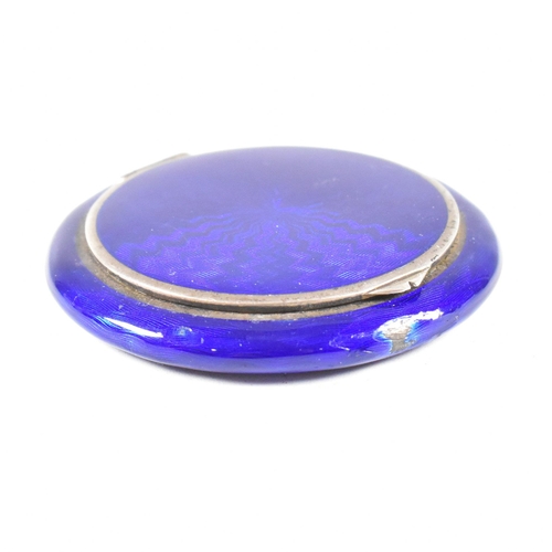 54 - A continental Austrian 925 Silver and guilloche enamel powder compact (AF). The make up compact havi... 