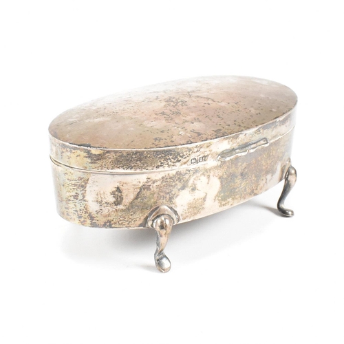 56 - A George V hallmarked silver mounted jewellery box. The trinket box having for hoof feet, rising to ... 