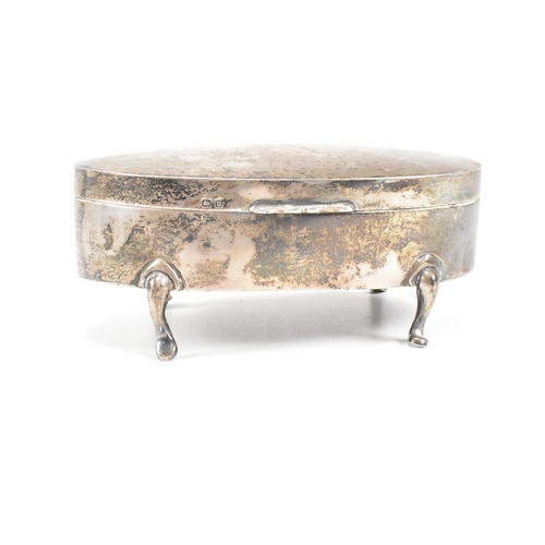 56 - A George V hallmarked silver mounted jewellery box. The trinket box having for hoof feet, rising to ... 