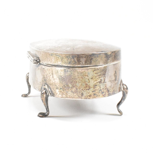 56 - A George V hallmarked silver mounted jewellery box. The trinket box having for hoof feet, rising to ... 