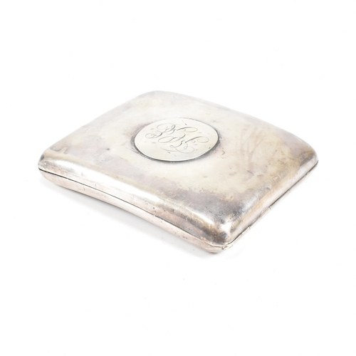 57 - A George V Hallmarked silver cigarette case. The case having a central monogrammed cartouche to fron... 