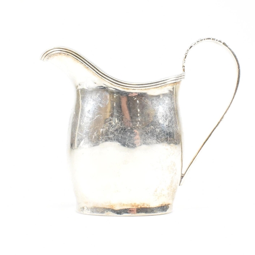 59 - An Edward VII Hallmarked silver creamer. The cream jug having an oval foot base raising to a bulbous... 