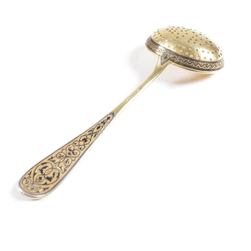 6 - VASILI SEMENOV - A late 19th century cased Russian silver gilt and niello tea service spoon suite. T... 