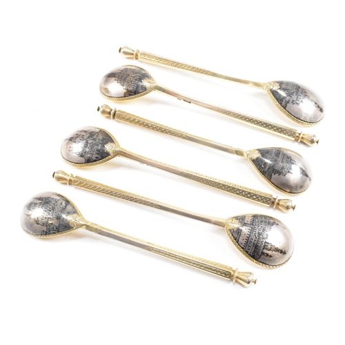 6 - VASILI SEMENOV - A late 19th century cased Russian silver gilt and niello tea service spoon suite. T... 