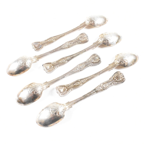 60 - A set of six Victorian hallmarked silver tea spoons. The spoons having a moulded scrolled design wit... 