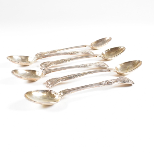 60 - A set of six Victorian hallmarked silver tea spoons. The spoons having a moulded scrolled design wit... 