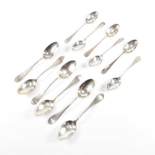 63 - Two sets of six hallmarked silver tea spoons with one Georgian set and a Victorian Set. The Victoria... 