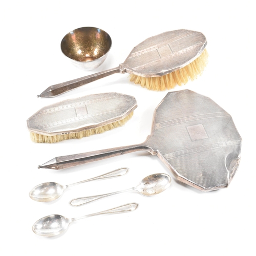 65 - Art Deco hallmarked silver three piece dressing set with silver bowl and spoons. The George V dressi... 