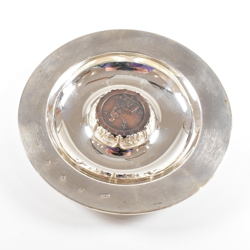 70 - A limited edition Royal Mint Britannia hallmarked silver coin dish. The trinket dish having a textur... 