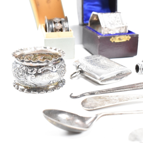 80 - A collection of hallmarked silver items. The lot to include an Edward VII cased napkin ring of octag... 