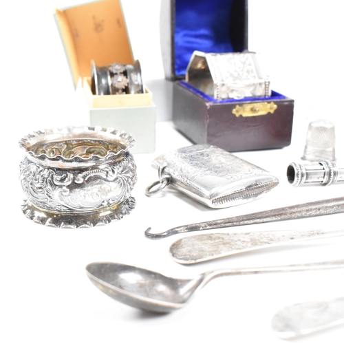 80 - A collection of hallmarked silver items. The lot to include an Edward VII cased napkin ring of octag... 