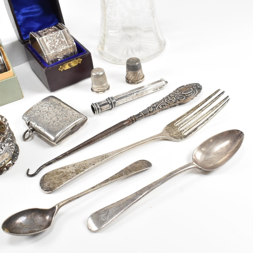 80 - A collection of hallmarked silver items. The lot to include an Edward VII cased napkin ring of octag... 