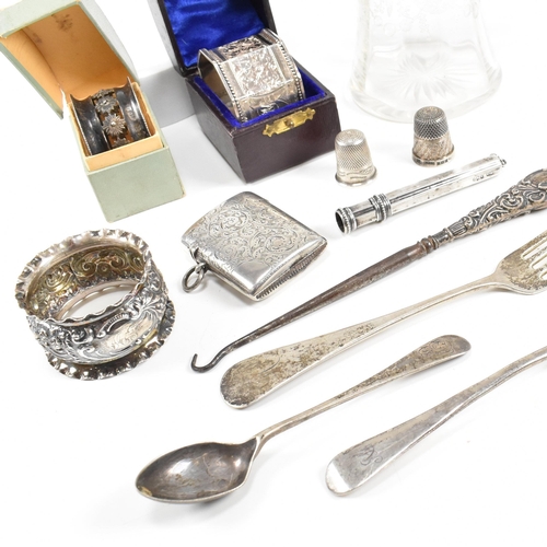 80 - A collection of hallmarked silver items. The lot to include an Edward VII cased napkin ring of octag... 