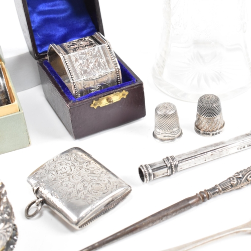 80 - A collection of hallmarked silver items. The lot to include an Edward VII cased napkin ring of octag... 