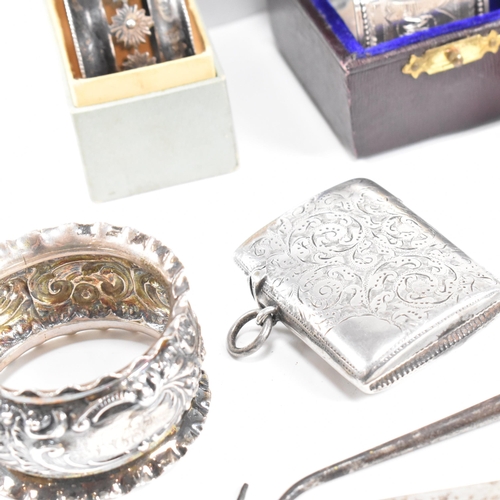 80 - A collection of hallmarked silver items. The lot to include an Edward VII cased napkin ring of octag... 