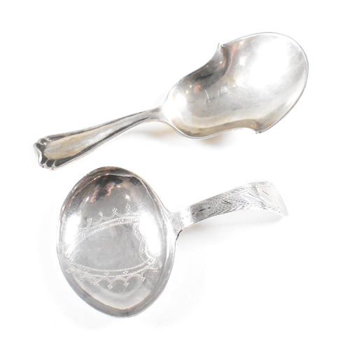 86 - Two hallmarked silver caddy spoons. To include a Georgian caddy spoon having an etched design and va... 