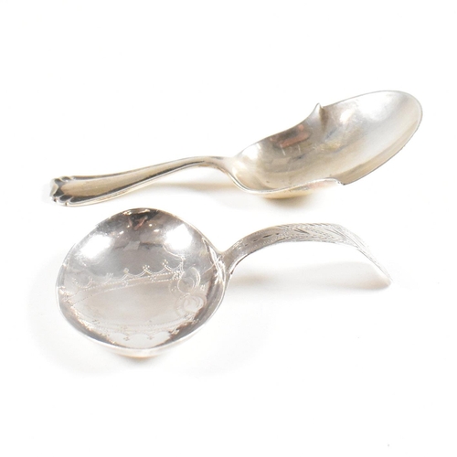 86 - Two hallmarked silver caddy spoons. To include a Georgian caddy spoon having an etched design and va... 