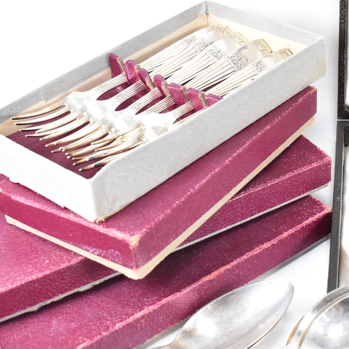 88 - A large collection of silver plated flatware. The lot to include a include a set of six silver plate... 