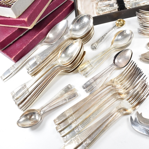 88 - A large collection of silver plated flatware. The lot to include a include a set of six silver plate... 