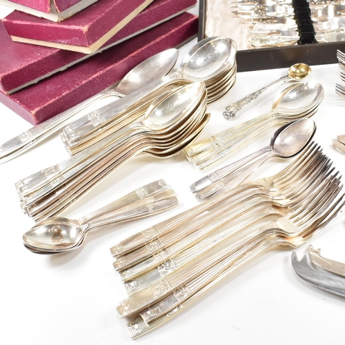 88 - A large collection of silver plated flatware. The lot to include a include a set of six silver plate... 