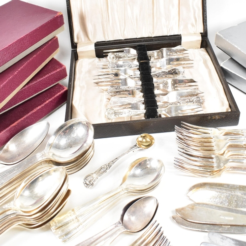 88 - A large collection of silver plated flatware. The lot to include a include a set of six silver plate... 