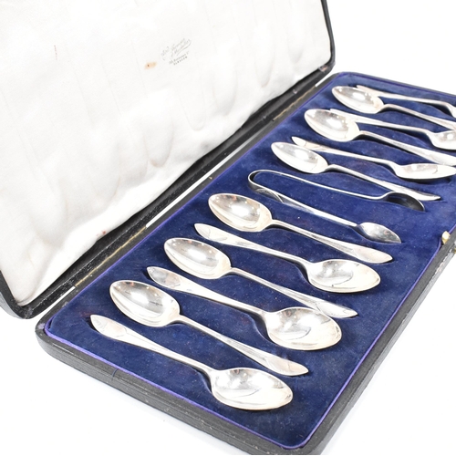 89 - A cased set of 12 hallmarked silver tea spoons and a pair of sugar tongs. Hallmarked for Sheffield, ... 