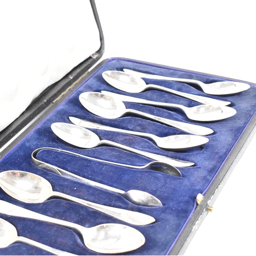 89 - A cased set of 12 hallmarked silver tea spoons and a pair of sugar tongs. Hallmarked for Sheffield, ... 