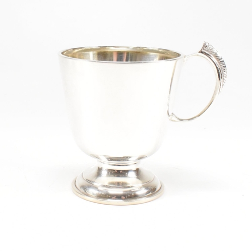 92 - A mid century hallmarked silver Christening cup. Hallmarked for Birmingham, 1963. Makers mark CBros ... 