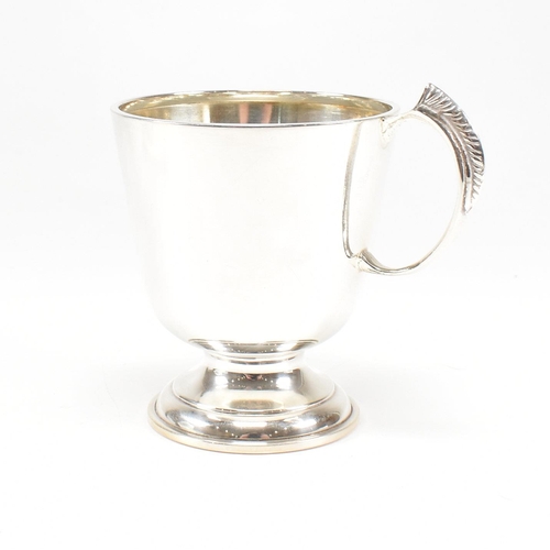 92 - A mid century hallmarked silver Christening cup. Hallmarked for Birmingham, 1963. Makers mark CBros ... 