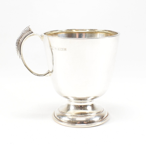 92 - A mid century hallmarked silver Christening cup. Hallmarked for Birmingham, 1963. Makers mark CBros ... 