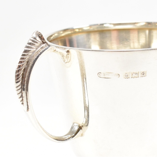 92 - A mid century hallmarked silver Christening cup. Hallmarked for Birmingham, 1963. Makers mark CBros ... 