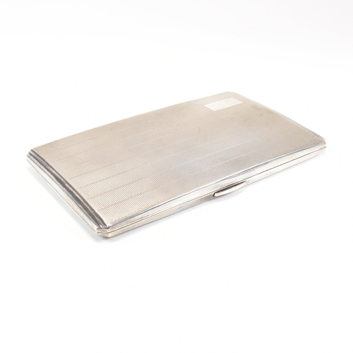 97 - A George VI hallmarked silver cigarette case. The case having an engine turned stripe pattern to the... 