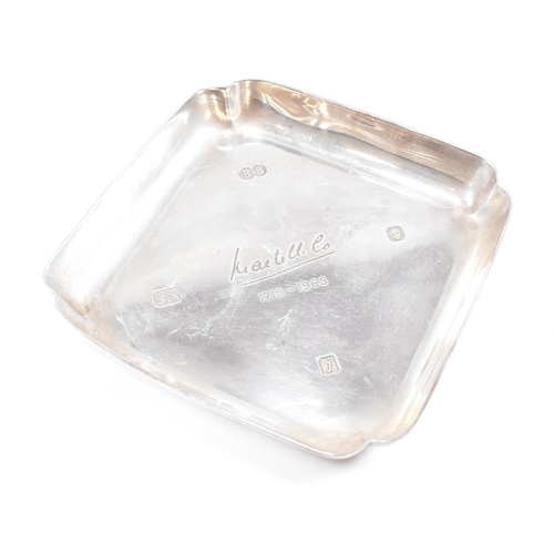 98 - A mid-century hallmarked silver ashtray. The ashtray or trinket dish being ofÿ square form with insc... 