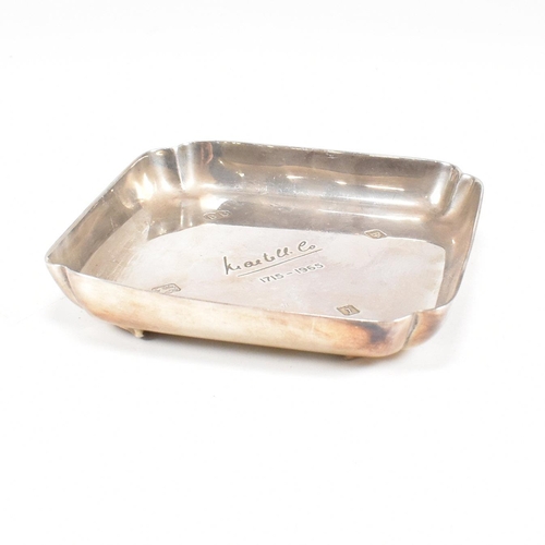 98 - A mid-century hallmarked silver ashtray. The ashtray or trinket dish being ofÿ square form with insc... 