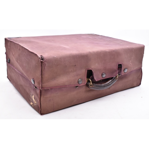 210 - A 1920s hallmarked silver and tortoiseshell leather cased travelling vanity set. The suite to includ... 