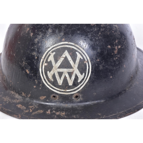 104 - A WWII Second World War British Home Front Brodie helmet. Painted to the inside rim Allen West Brigh... 