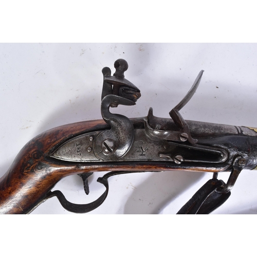 109 - A 19th Century Eastern Flintlock Jezail. The stock having a typical distinct curve, lock plate impre... 