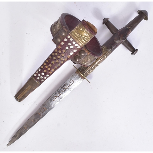 111 - An early 20th Century Berber / Tuareg tribal arm dagger. Dome shaped pommel with a cruciform hilt wi... 