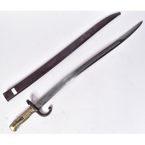 116 - A 19th Century French 1866 pattern ' Chassepot ' rifle bayonet. The bayonet having ribbed brass hilt... 