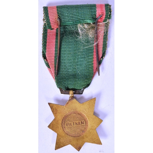 121 - A Vietnam War era South Vietnam Civil Actions medal (Dan Vu Boi Tinh). Bronze 8 pointed star superim... 