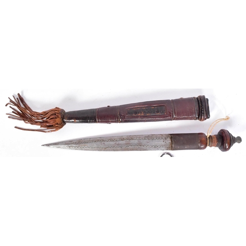 137 - A collection of x4 19th Century African tribal knives / daggers comprising; a pair of matching toole... 