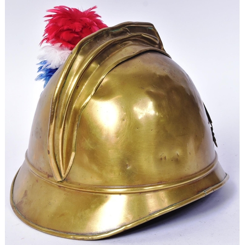 142 - An early WWII Second World War circa 1930 French Fireman's helmet. Brass with split pin ' comb ', tr... 