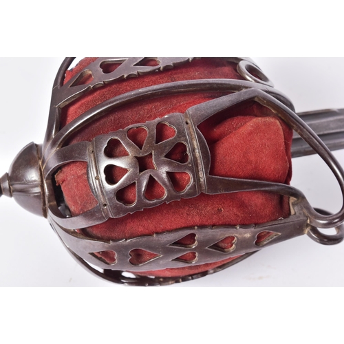 160 - An early 19th Century Scottish 1828 pattern basket hilted broadsword. Dome shaped pommel with ball f... 