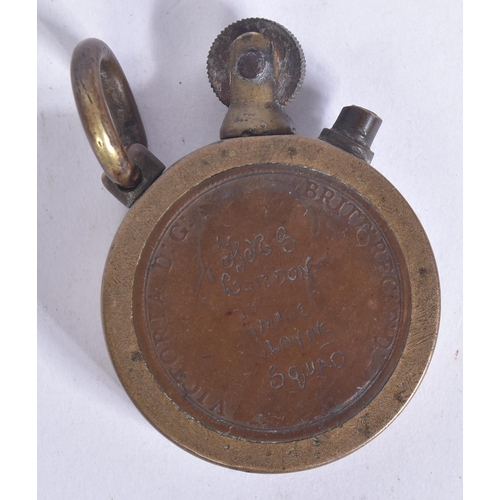 167 - WWI First World War Interest - a brass trench art style cigarette lighter with inset penny coins to ... 