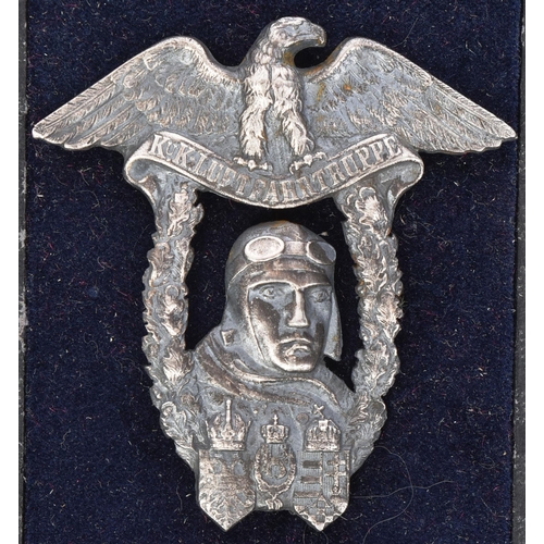 172 - A WWI First World War Austro-Hungarian pilot / flyers badge depicting an aviator's head with within ... 