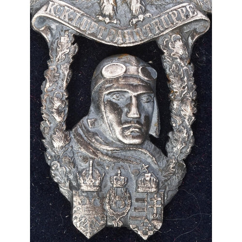 172 - A WWI First World War Austro-Hungarian pilot / flyers badge depicting an aviator's head with within ... 